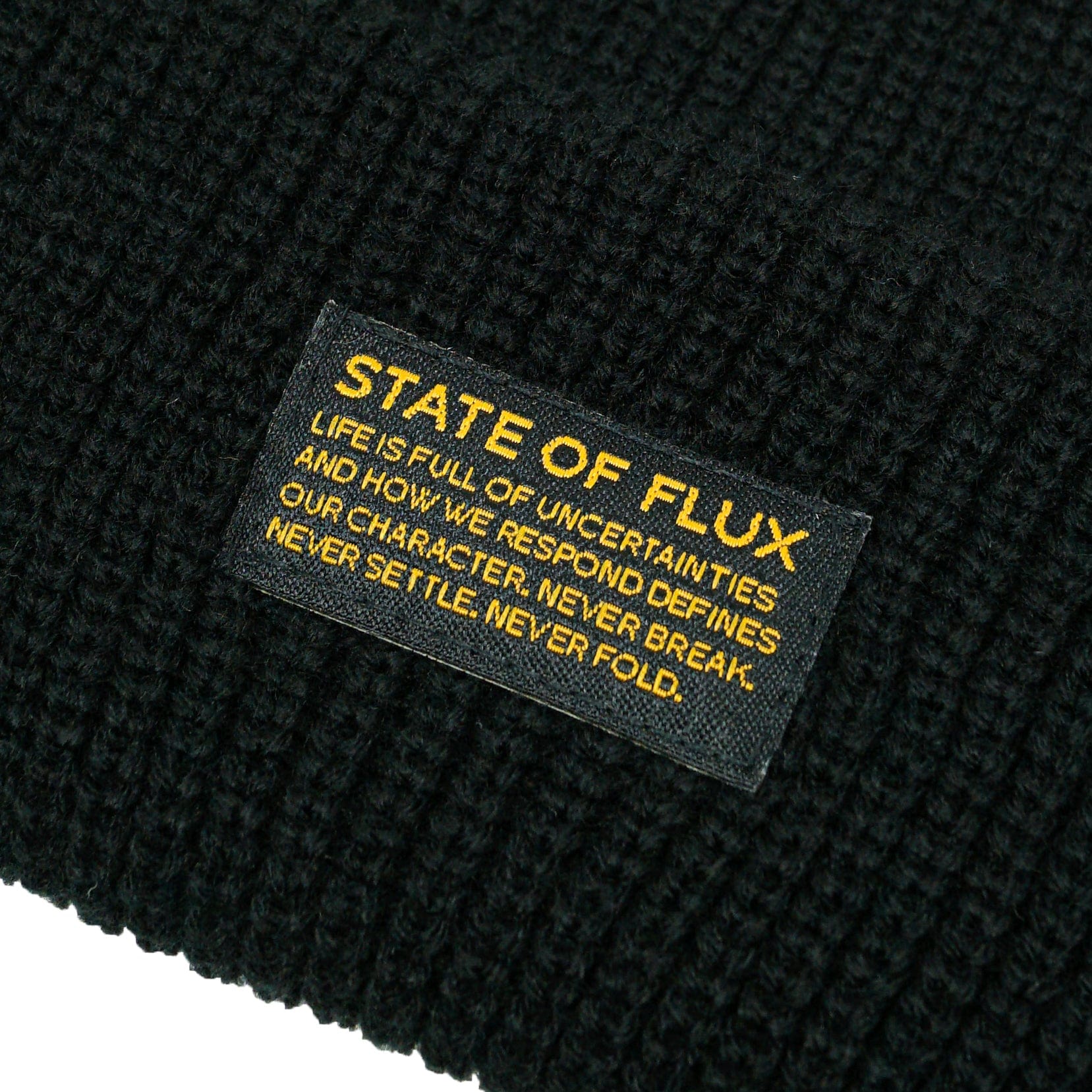 Knitted Mantra Beanie in black - State Of Flux - State Of Flux