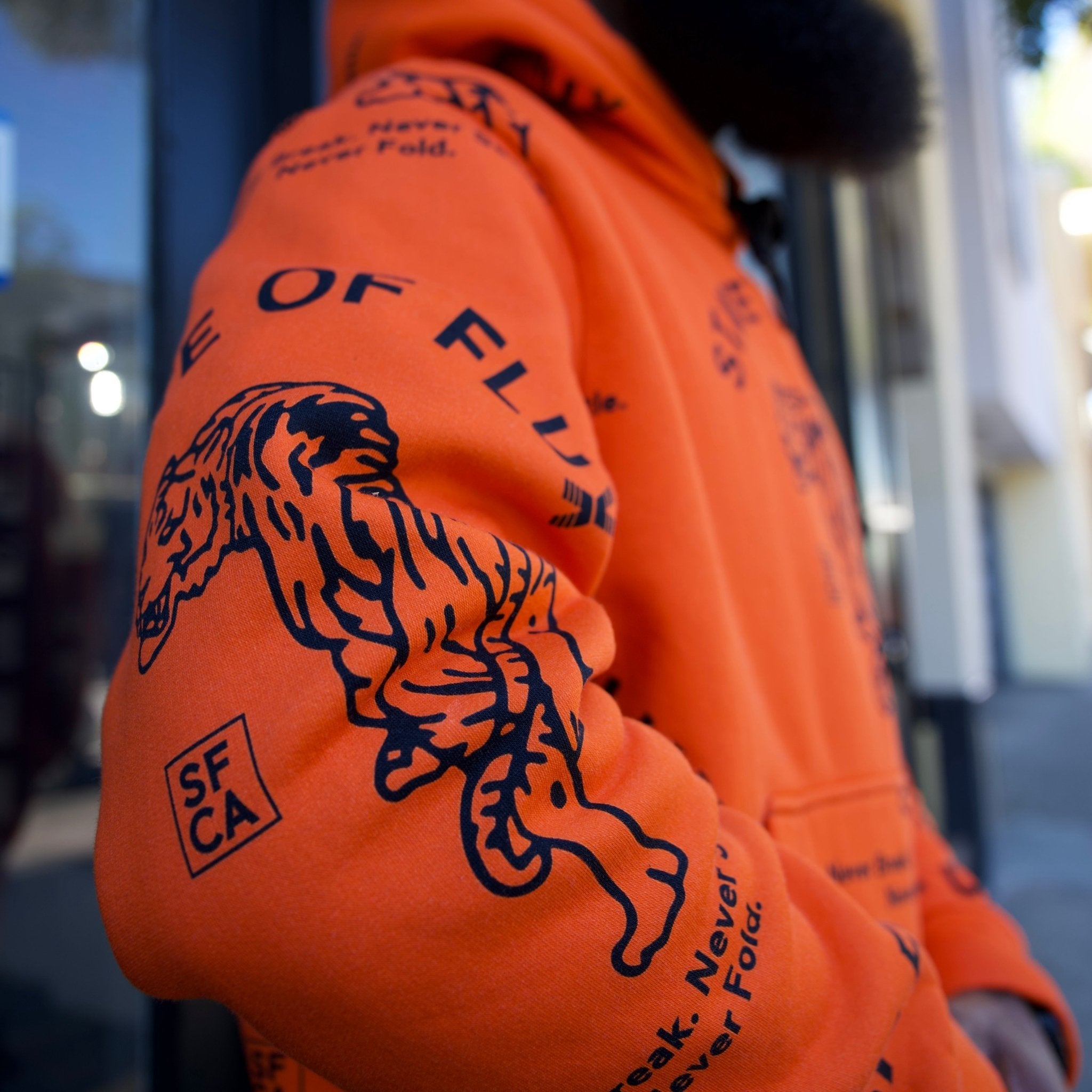 **PREORDER ONLY** Allover Prowler Hoodie in orange and black